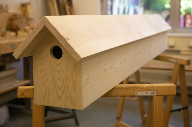 image of untitled birdhouse project before any of the colors were applied, also without its feet